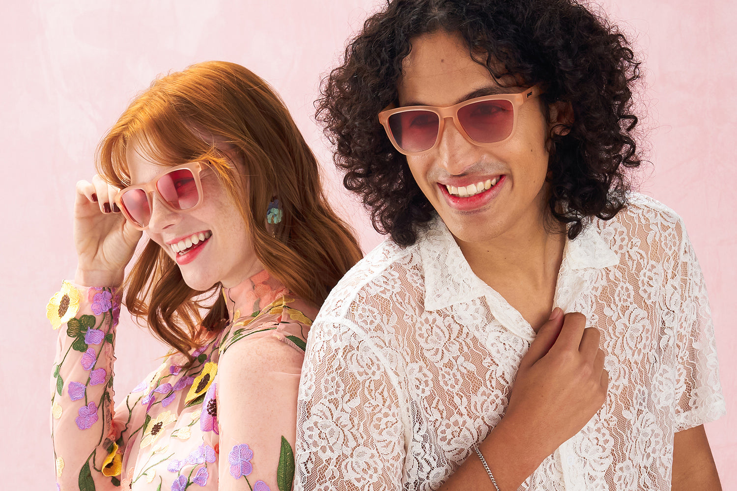 Man And Woman Wearing Pink Sunglasses