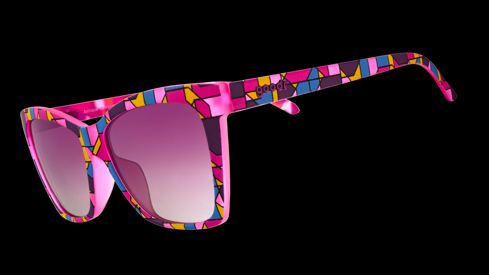 Three-quarter angle view of purple Pop G cat-eye shades with a stained glass-inspired design and purple gradient lenses.