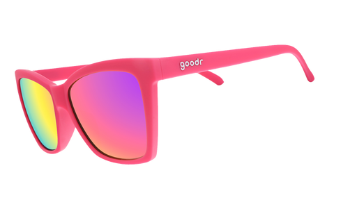 Three-quarter angle view of hot pink angled cat-eye sunglasses with pink reflective lenses.