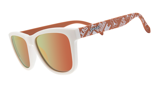 The image displays a pair of sunglasses with a white front frame and orange reflective lenses. The arms of the sunglasses are orange and decorated with University of Texas Longhorns logos