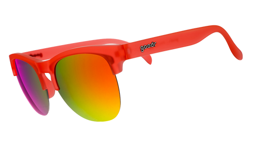 Three-quarter angle view of red-orange half-rim sunglasses with reflective red-orange lenses.