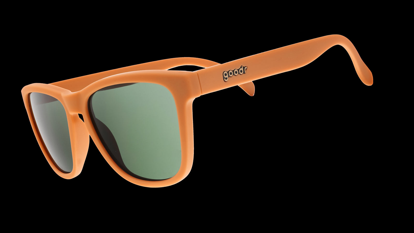 Three-quarter angle view of classic brown sunglasses with green non-reflective lenses.