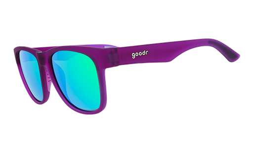 Three-quarter angle view of wide-fit purple sunglasses with square-shaped green reflective lenses.