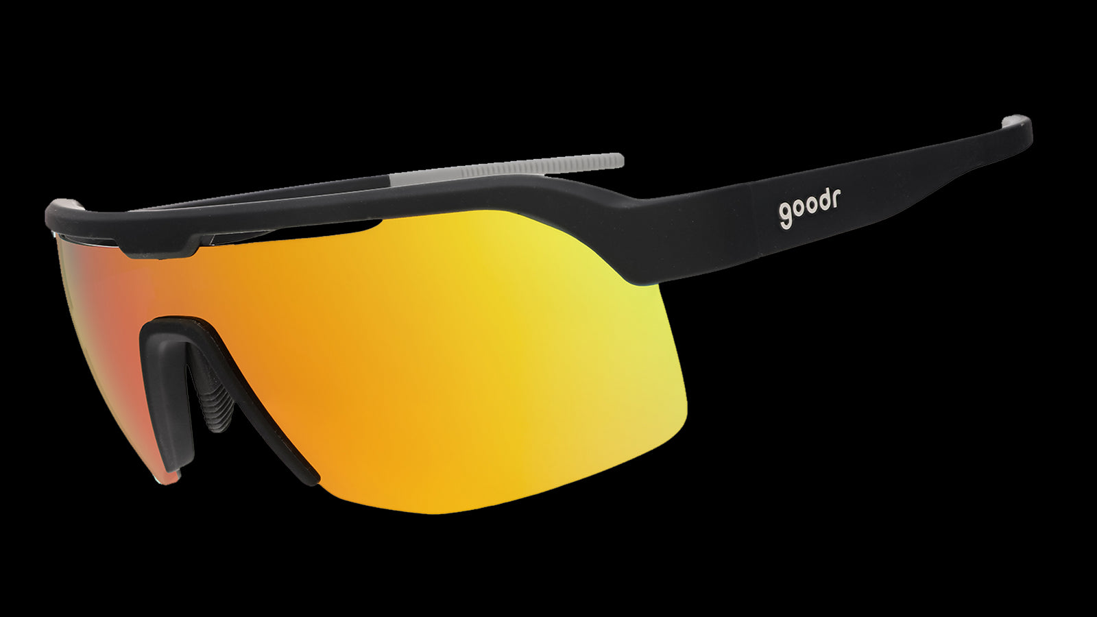 Sunglasses with black frame and orange-tinted lenses on a white background