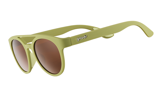Three-quarter angle view of olive green double bridge sunglasses with non-reflective warm brown lenses.
