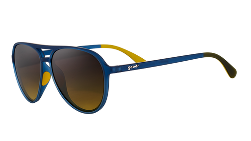 Three-quarter angle view of navy blue aviator sunglasses with dark amber gradient lenses.