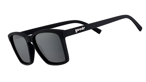 Three-quarter angle view of square-shaped black sunglasses with non-reflective lenses.