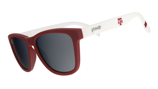 Three-quarter angle view of white and burgundy Texas A&M® Aggies™ sunglasses with chrome lenses.