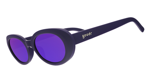 Three-quarter angle view of a pair of deep purple, oval-shaped sunglasses frames with matching purple reflective lenses.