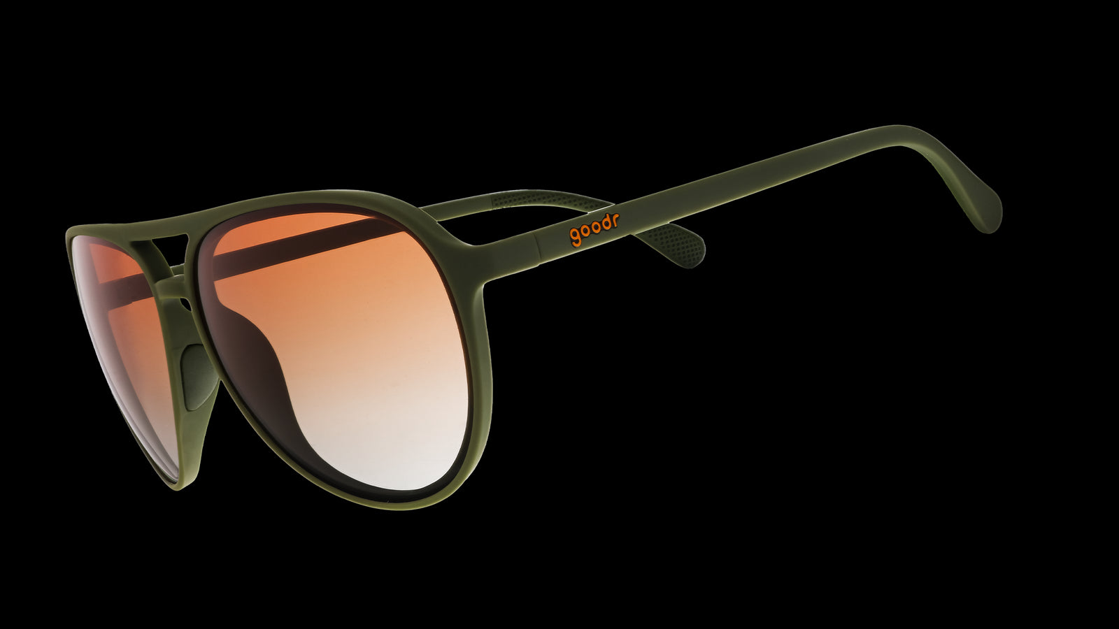Three-quarter angle view of green aviator sunglasses with amber gradient lenses.