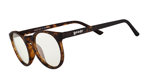 Three-quarter angle view of round brown tortoiseshell glasses with clear blue-light-blocking lenses.