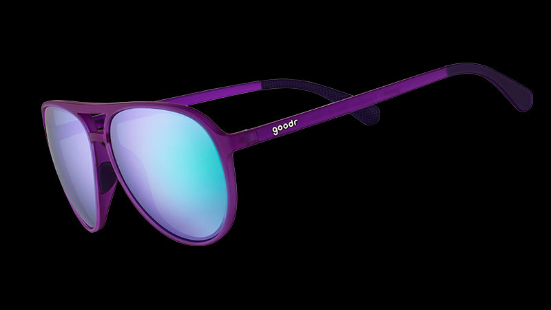 Three-quarter angle view of purple aviator sunglasses with green reflective lenses.