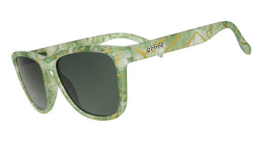 Three-quarter angle view of kintsugi shades with green lenses, ethereal marbled green frames, and gold crack accents.
