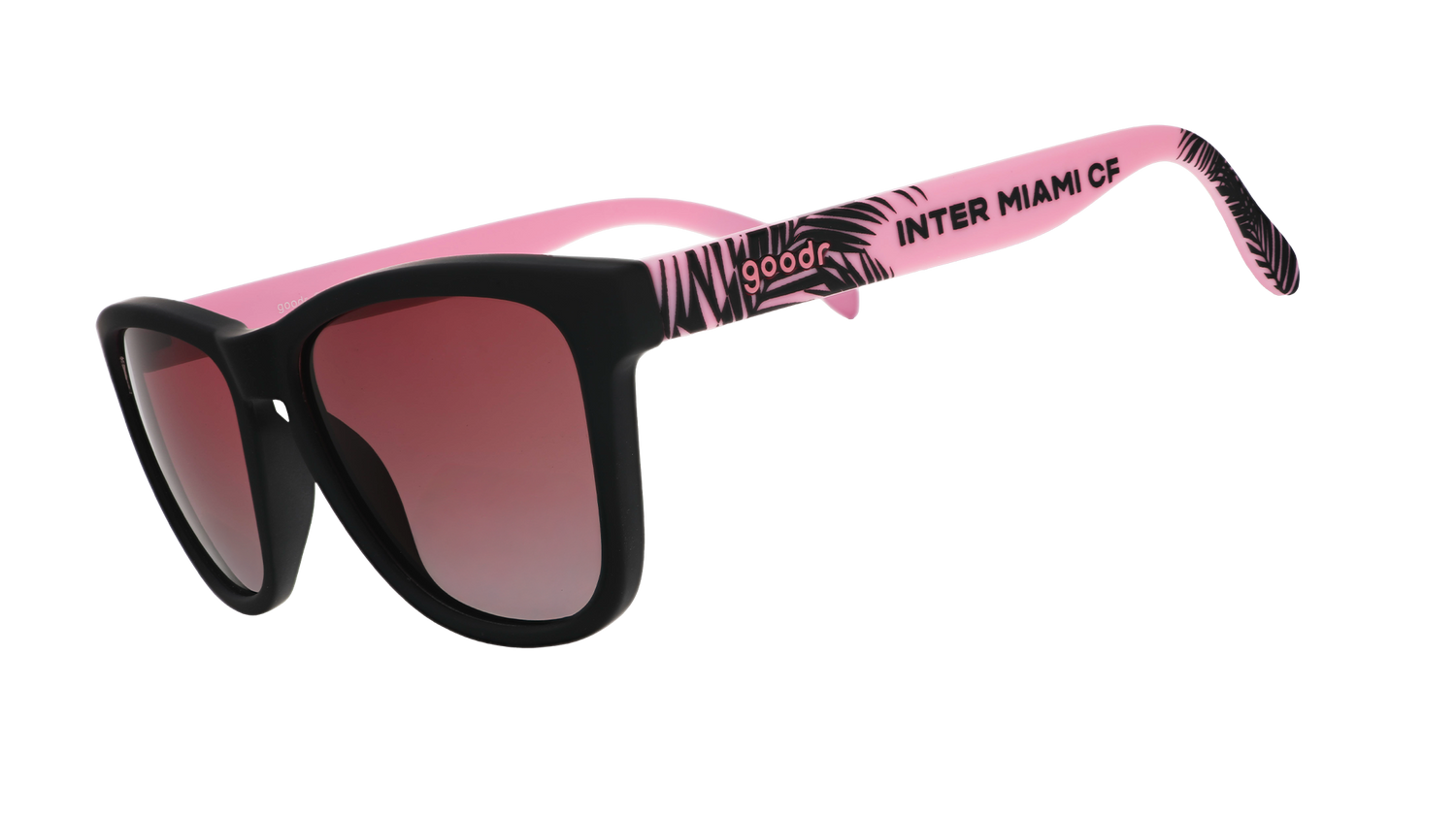 Three-quarter angle view of Inter Miami CF Major League Soccer sunglasses with black and pink frames and rose lenses.