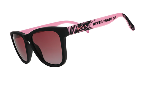 Three-quarter angle view of Inter Miami CF Major League Soccer sunglasses with black and pink frames and rose lenses.