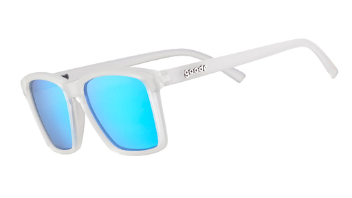 Three-quarter angle view of slim-fit clear sunglasses with square-shaped reflective blue lenses.
