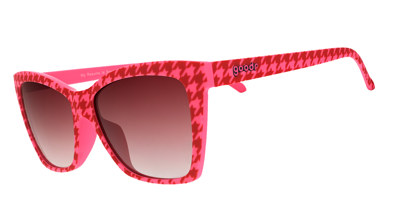 Three-quarter angle view of pink and red houndstooth Pop Gs with rose gradient lenses.