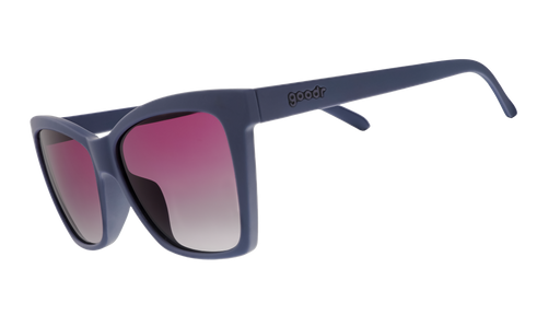 Three-quarter angle view of dark purple angular sunglasses with purple gradient lenses.