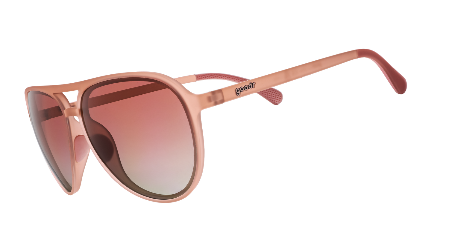 Three-quarter angle view of translucent pink aviator sunglasses with rose gradient lenses.