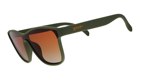 Three-quarter angle view of green one-lens sunglasses with orange-gold ocean gradient lenses.