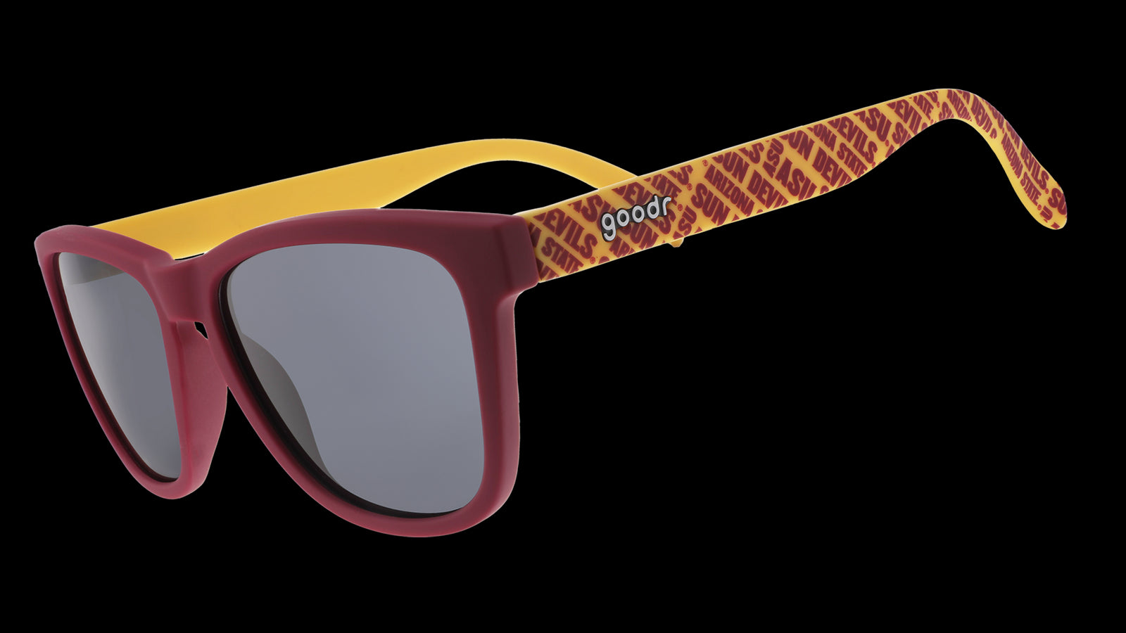 Three-quarter angle view of dark red and yellow sunglasses with an ASU print and black lenses.