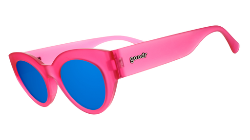 Three-quarter angle view of a pair of translucent hot pink modern cat-eye frames with dazzling blue reflective lenses.
