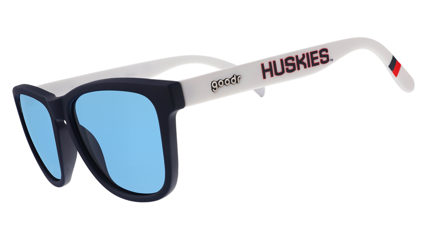 Three-quarter angle view of navy blue and white sunglasses with the Huskies logo and blue lenses.