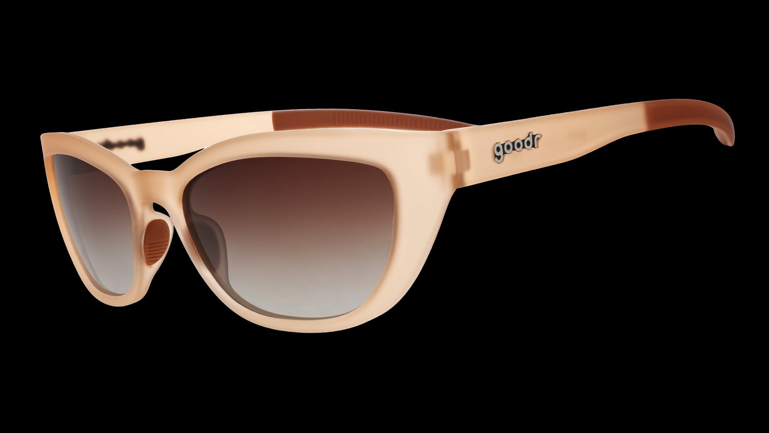 Three-quarter angle view of a pair of translucent brown cat-eye Cheetah Gs with brown gradient lenses.
