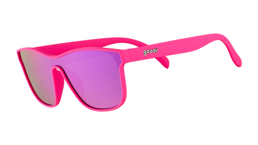 Three-quarter angle view of futuristic hot pink sunglasses with a flat purple single lens.