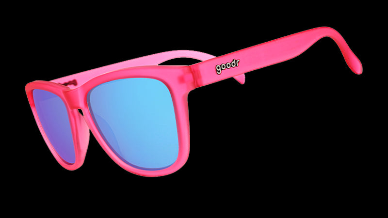 Three-quarter angle view of pink sunglasses with teal reflective lenses.