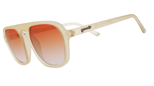 Sunglasses with translucent tan frames and gradient amber lenses.