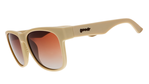 A pair of square sunglasses with tan frames and burnt orange lenses.
