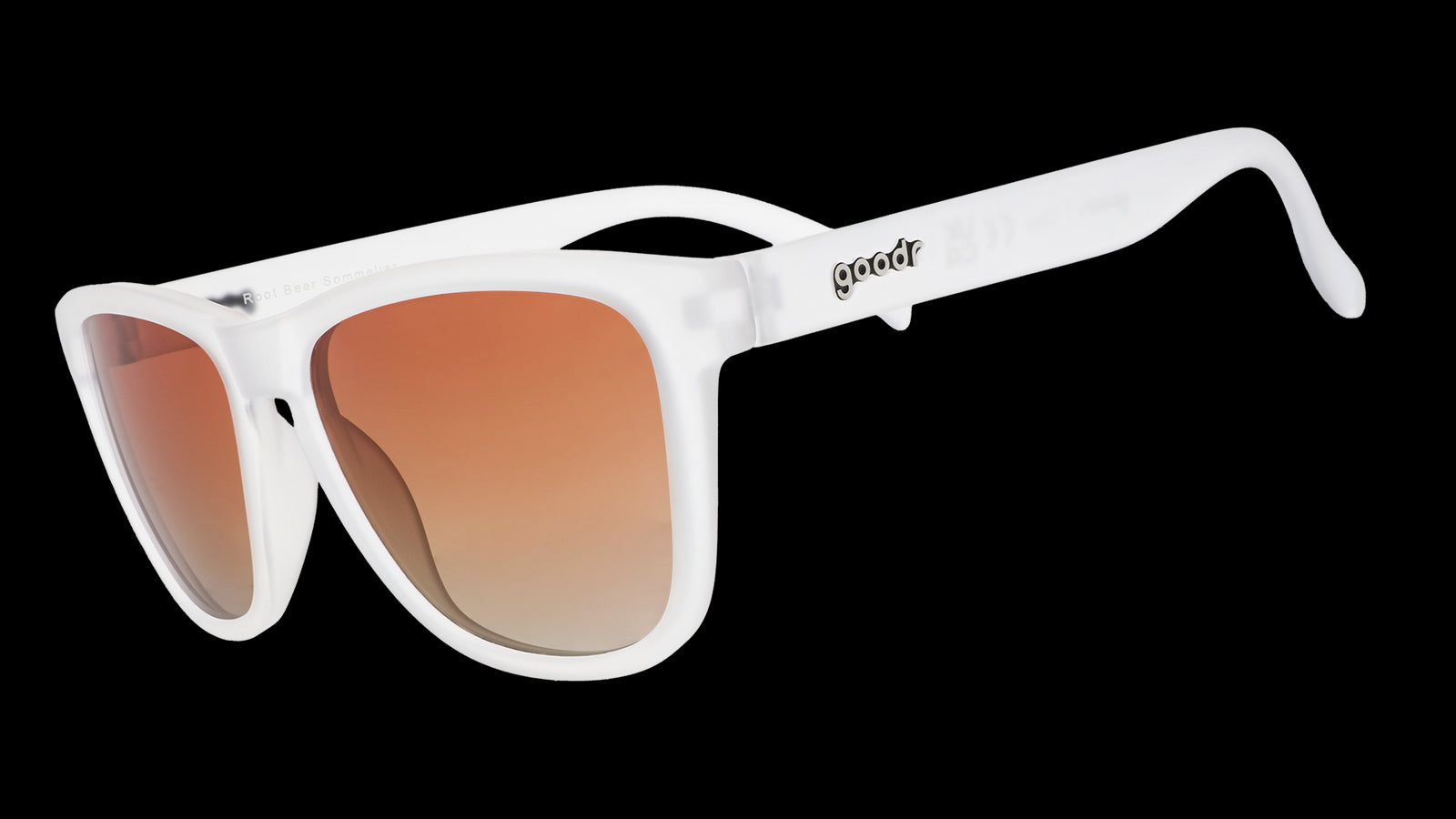 Three-quarter view of a pair of clear sunglasses with brown gradient lenses in a classic frame shape.