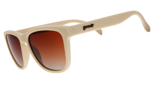 A pair of square sunglasses with light beige frames and orange lenses.