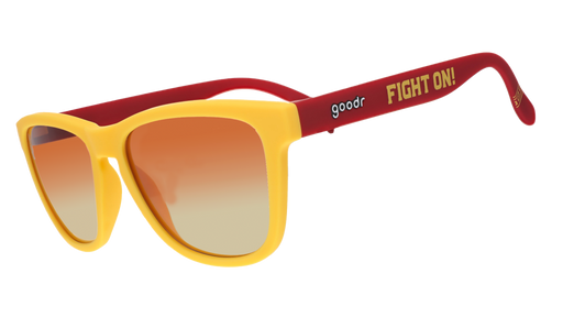 A pair of sunglasses with bright yellow frames and red arms, featuring the words "Fight On!" in bold yellow text on the side. The lenses have a gradient from orange to light.