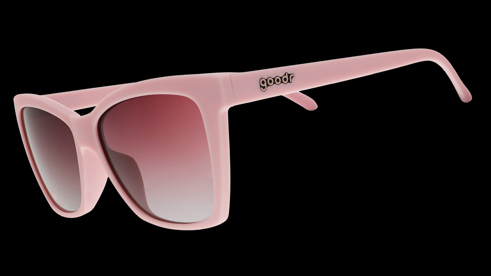 A pair of cat-eye sunglasses with light pink frames and rosy lenses.