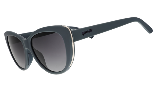 A pair of grey cat eye sunglasses with dark lenses and gold accents on the sides of each frame.