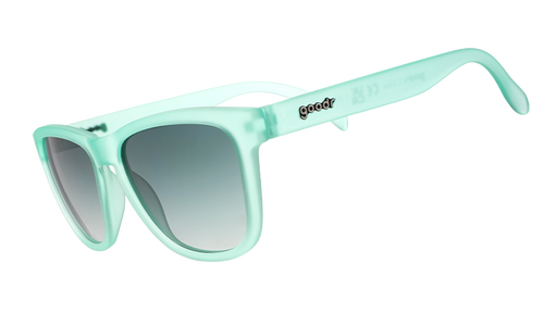 Light mint green sunglasses with a glossy finish, featuring gradient lenses and the "goodr" logo on the temple.