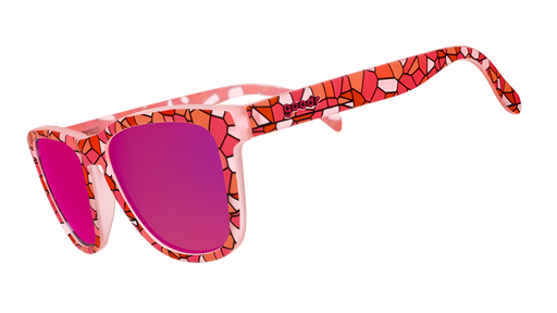 Three-quarter angle view of a pair of pink OGs with a multi-colored stained glass-inspired design and pink reflective lenses.