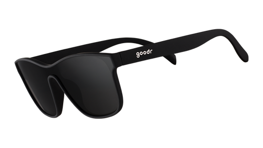 Three-quarter angle view of futuristic-looking black sunglasses with a non-reflective black flat single lens.