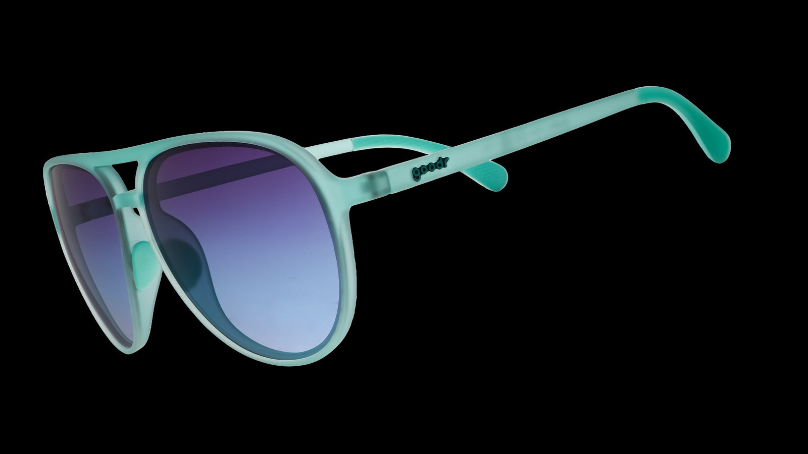 Three-quarter angle view of translucent teal aviator sunglasses with dark blue gradient lenses.