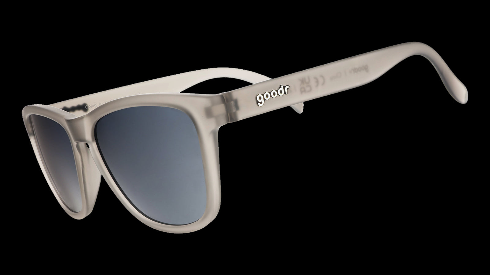 A pair of grey, square shaped sunglasses on a white background.