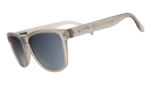 A pair of grey, square shaped sunglasses on a white background.