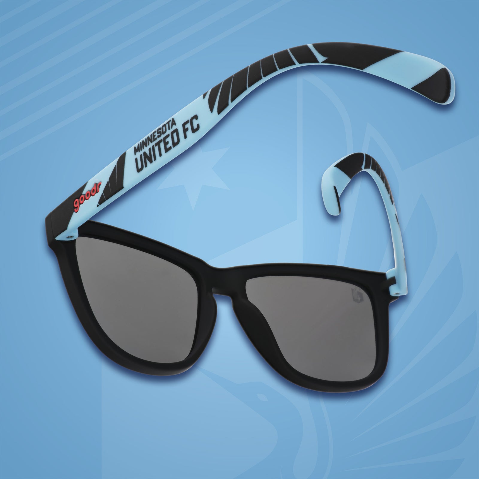 Three-quarter angle back view of Minnesota United FC shades on a blue background. Blue+black frames. Blue lenses.