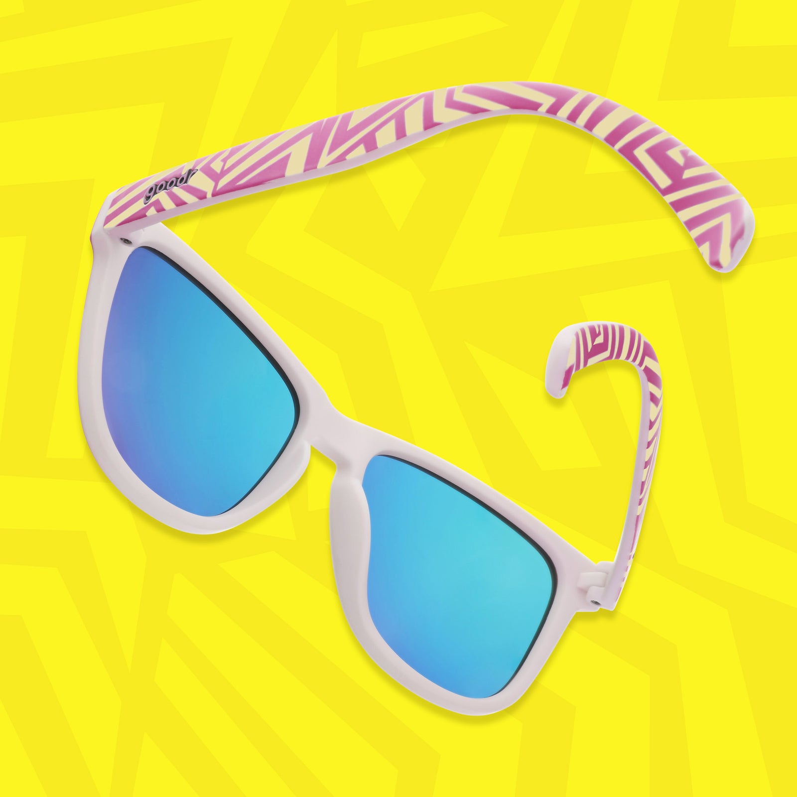 A pair of sunglasses with a bright geometric purple and yellow design on the arms was photographed from behind on a yellow geometric background.