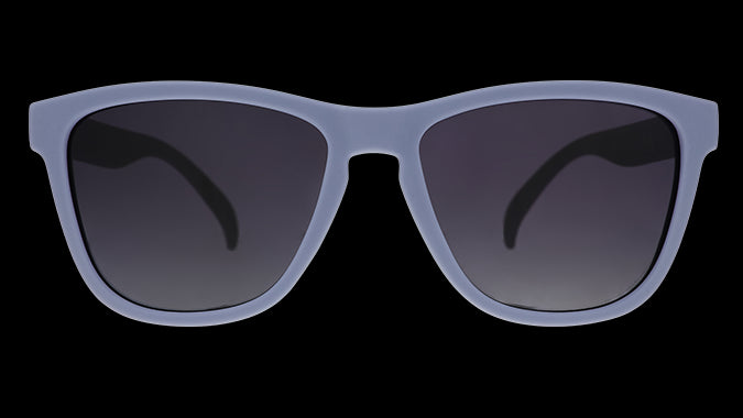 A pair of square sunglasses with lavender frames and lenses.