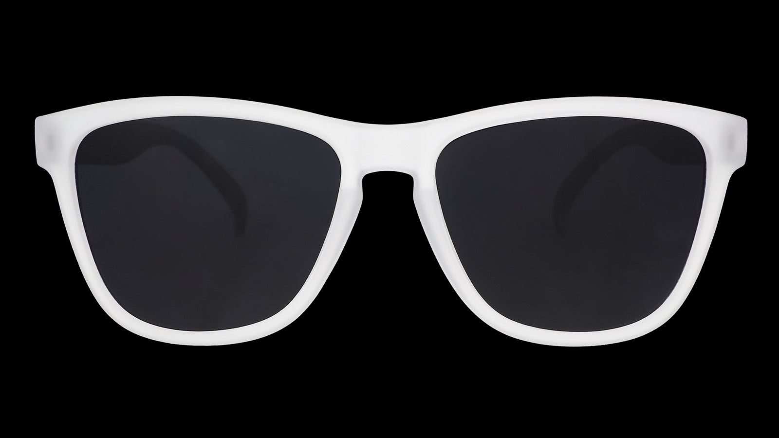 Front-facing view of a pair of clear sunglasses in a classic frame shape with black, non-reflective lenses.