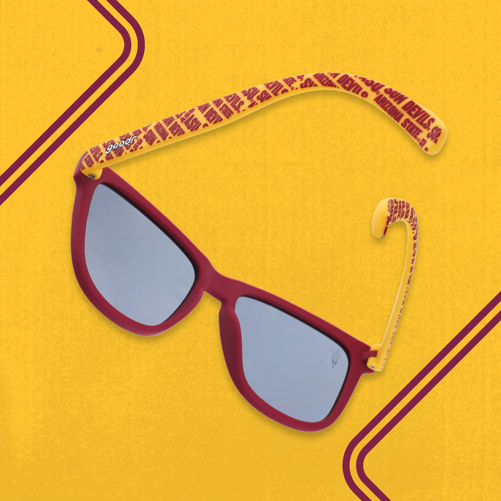 Three-quarter back angle view of dark red and yellow sunglasses with an ASU print and black lenses.