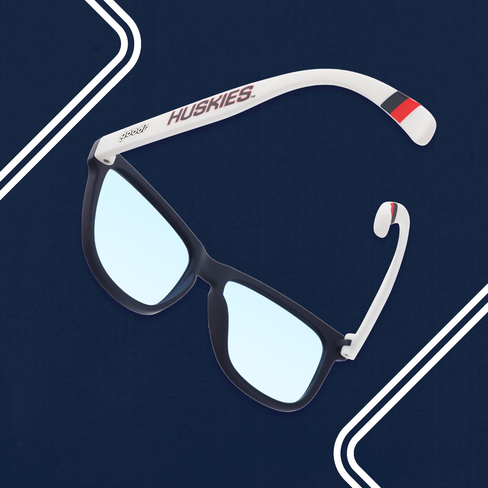 Three-quarter back angle view of navy blue and white sunglasses with the Huskies logo and blue lenses.