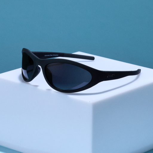 Three-quarter angle view of black wraparound sunglasses with black non-reflective lenses.